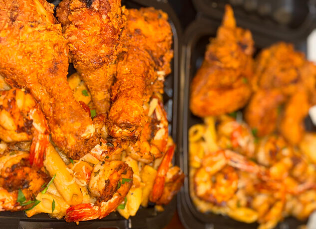 Dark meat Chicken & Shrimp Rasta Pasta and 3-wing pictured.